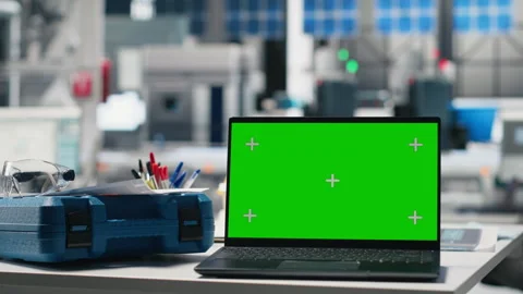 Empty engineering desk in a solar power manufacturing plant with green screen Stock Footage 311601309