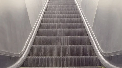 Empty escalator close up of moving steps. 動画素材 93486413