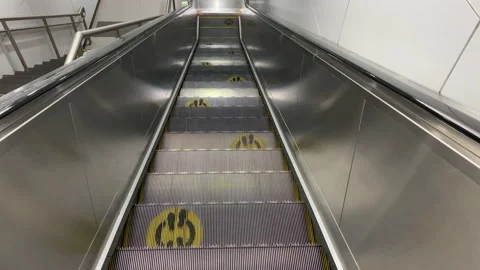 Empty Escalator Going Down During Covid-19 Pandemic Stock Footage 156277663
