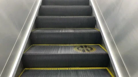 Empty Escalator Going Up During Covid-19 Pandemic Stock Footage 156277701