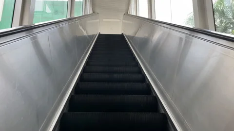 Empty Escalator Going Up Towards an MRT Station During Covid-19 Pandemic Stock Footage 156277676