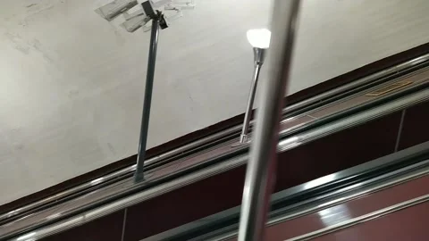 Empty escalator movement in subway side view Stock Footage 179416878