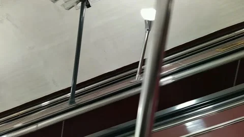 Empty escalator movement in subway side view Stock Footage 179416989