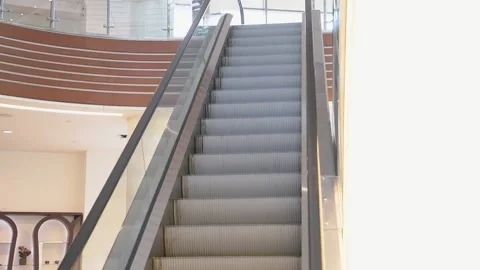 Empty escalator moving down Stock Footage 104510018