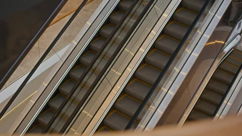 Empty Escalator Moving in Shopping Mall Setting Stock Footage 335260031