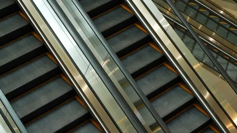 Empty escalator moving transport on floor of modern building Stock Footage 90485351