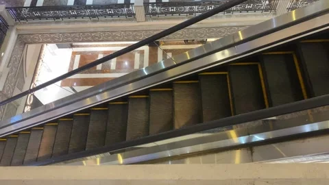 An empty escalator moving upward Stock Footage 308987768