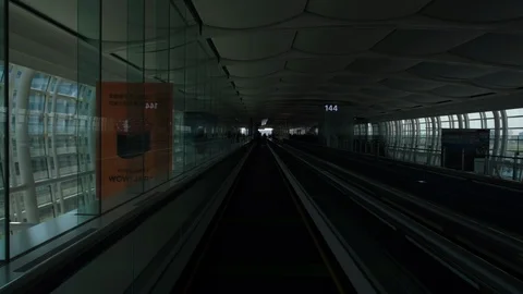 Empty escalator running in departure hall at Haneda Airport, Tokyo, Japan. Stock Footage 123817468
