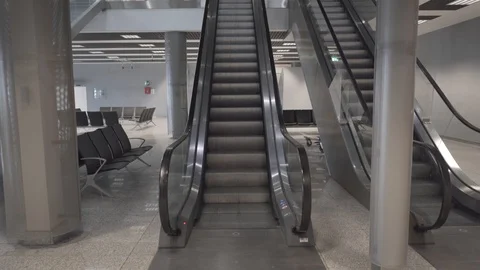 Empty escalator runs at the aiport without people Stock Footage 104602179