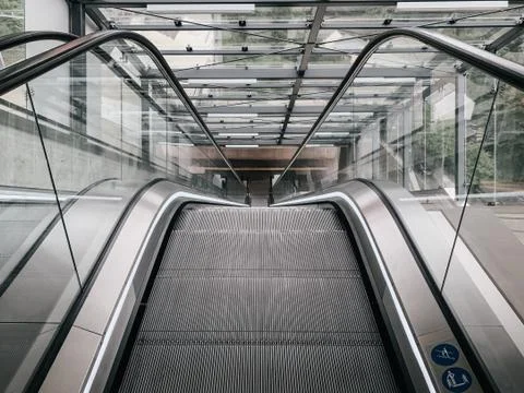 Empty escalator in station Stock Photos