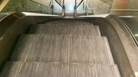 An empty escalator steps going up 動画素材 260415229