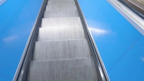 Empty escalator in underground moving down Stock Footage 107495907