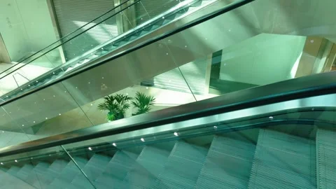 Empty escalators moving inside modern shopping mall interior. Retail commerce Stock Footage 335144204