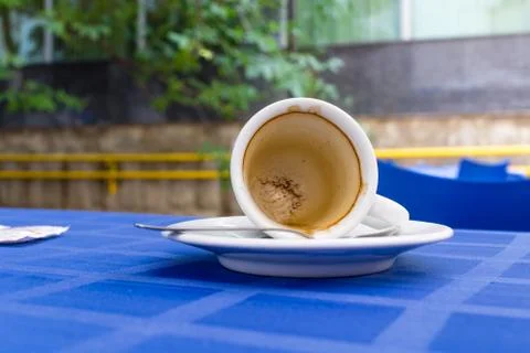 Empty espresso cup on the table. Stock Photos
