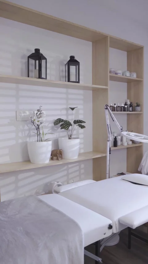 Empty esthetic treatment room bathed in soft natural light Stock Footage 342820528