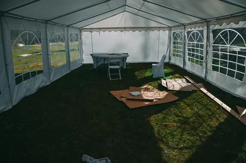 Empty Event Tent Interior Setup with Tables and Chairs Photos