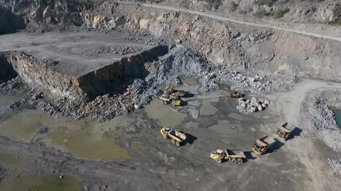 Empty excavators in a granite quarry Stock Footage 200827411