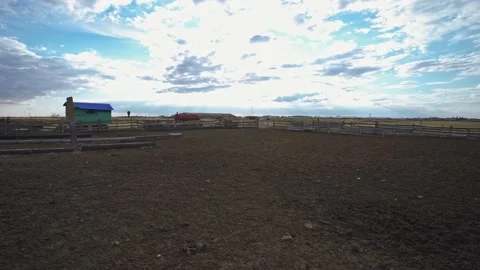 An empty farm without workers and animals. Bankrupt farming. Cattle hangar. Stock-Footage 135870648