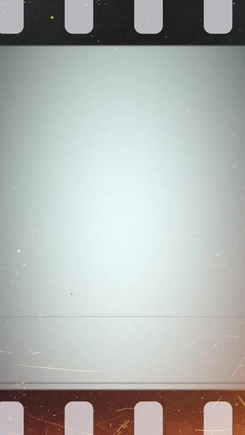 Empty film frames transitioning with light leaks and scratches Stock Footage 314594238