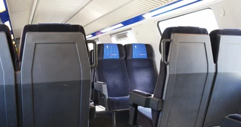 Empty First Class Train Cabin Interior with Blue Seats Stock Footage 339194244