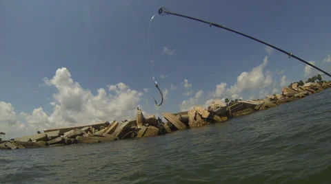 Empty fish hook dangling in front of camera Stock Footage 39383182