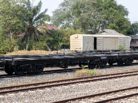Empty Flatcar Wagon on Railway Tracks Stock Photos