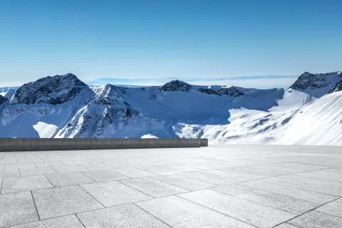 Empty  floor with snow mountains on background Fotos de archivo