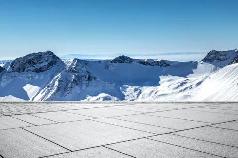 Empty  floor with snow mountains on background Fotos de archivo