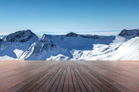 Empty  floor with snow mountains on background Fotos de archivo