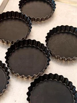 Empty Fluted Tart Baking Pans Фото