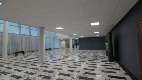 Empty foyer with tiled floor and columns of theater building Video stock 170905688