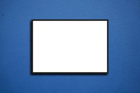 Empty frame. Blank black mounted portrait frame on white brick wall Stock Photos