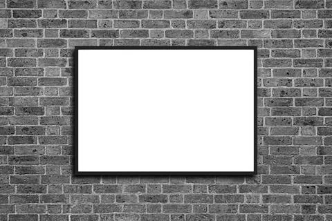 Empty frame. Blank black mounted portrait frame on white brick wall Stock Photos