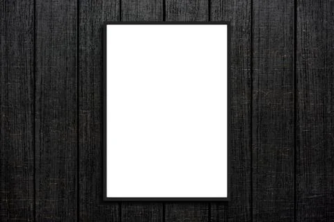 Empty frame. Blank dark grey mounted landscape frame on white wood panel wall Stock Photos