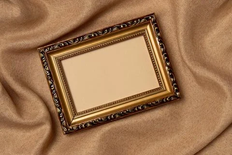 Empty frame on a fabric background from above. Vintage style. Top view, copy  Stock Photos