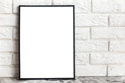 Empty frame mock-up in minimalist interior Stock Photos