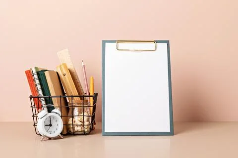 Empty frame mockup, desktop organizer with school stationary and office sup.. Stock Photos