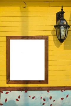 Empty frame on the wall yellow Stock Photos