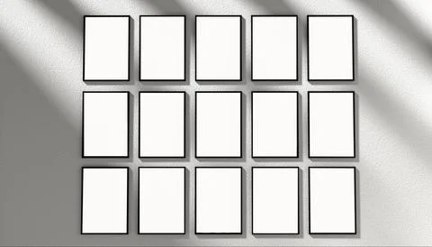Empty frames on textured wall illuminated by sunlight shadows creating depth  Stock Photos