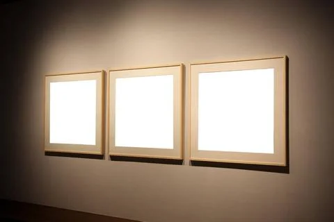 Empty frames three empty frames against exhibition wall Copyright: xZoonar... Foto stock