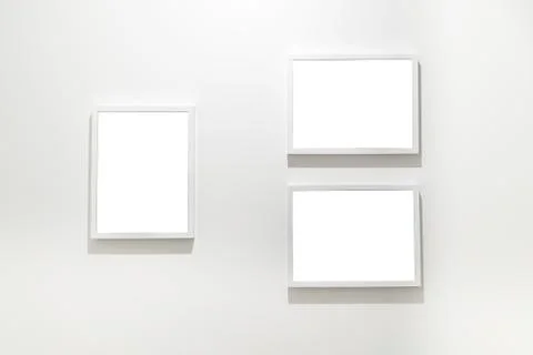 Empty Frames on the wall in modern art museum Gallery Exhibit Stock Photos
