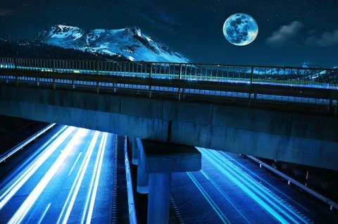 Empty freeway at night with long exposure Stock Photos