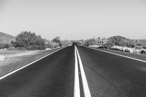 Empty freeway in sunset Stock Photos