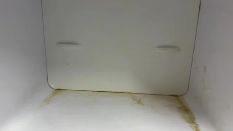 Empty freezer compartment inside old refrigerator, worn interior of vintage Stock Footage 337116790
