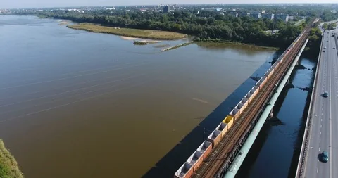 Empty Freight Cargo Passing Bridge. Aerial Shot Stock Footage 93339483