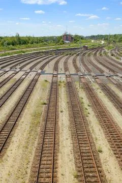 Empty freight railway yard with many tracks and operations control tower Stock Photos