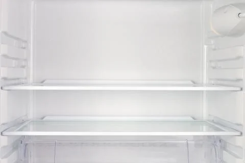 Empty fridge as backdrop Stock Photos