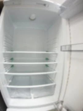 Empty fridge distorted and blurred Stock Photos