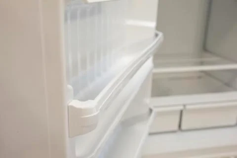 Empty fridge shelf Stock Photos