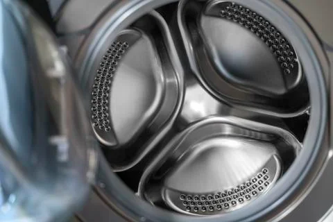 Empty front-loaded washing machine drum 스톡 사진